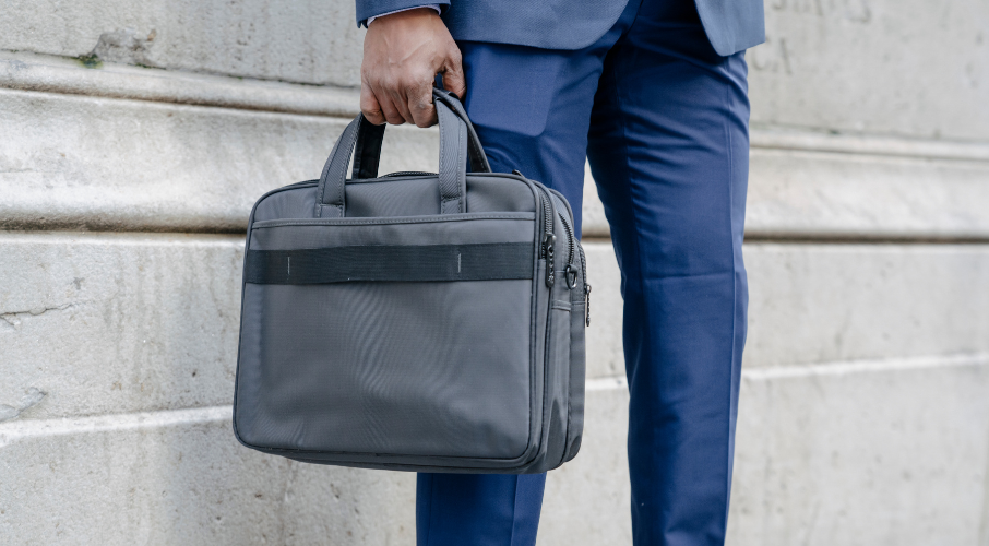 Man in suit holding briefcase